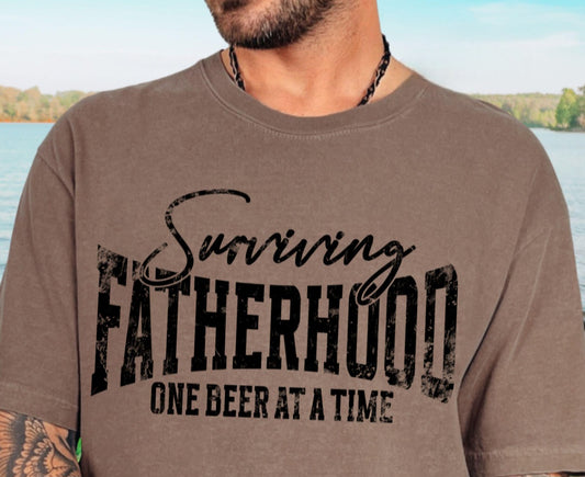 Surviving Fatherhood -  Crewneck, Hoodie, or T-Shirt