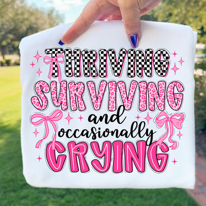 Thriving, Surviving and Occasionally Crying - Comfort Colors Tee